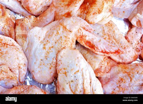 Seasoned Chicken Wings Uncooked Stock Photo Alamy