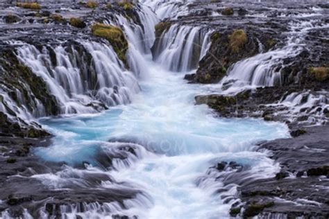 Iceland Bruarfoss Waterfalls Flow Into River Photographic Print By