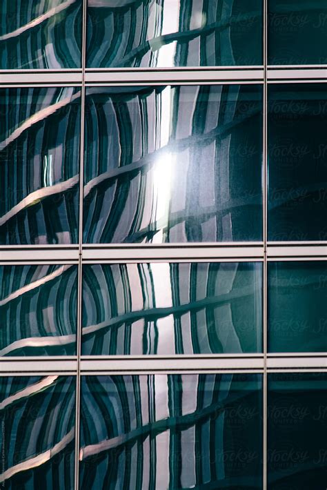 Windows Abstract Pattern And Reflection On A Modern Skyscraper