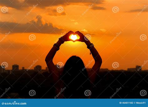 Sunset Of Girl Catching Sun In Heart Stock Photo Image Of City Sunny