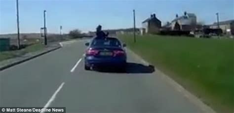 Car Passenger Caught Taking Selfies Out Of The Sunroof Daily Mail Online