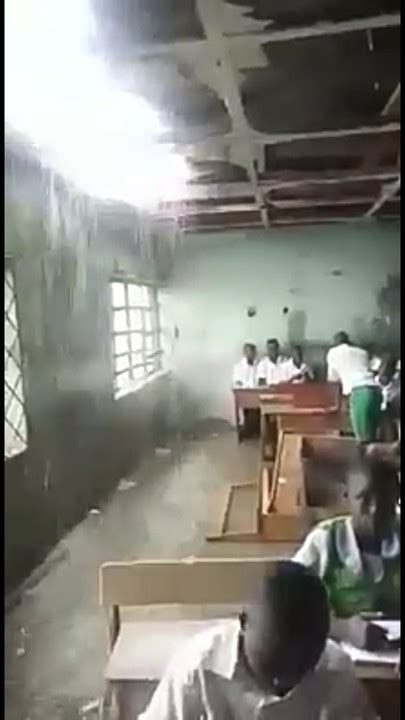Sigh Students Studies Inside A Dilapidated Classroom As Rain Falls
