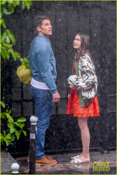 Full Sized Photo Of Lily Collins Caught In Rain With Lucas Bravo Emily