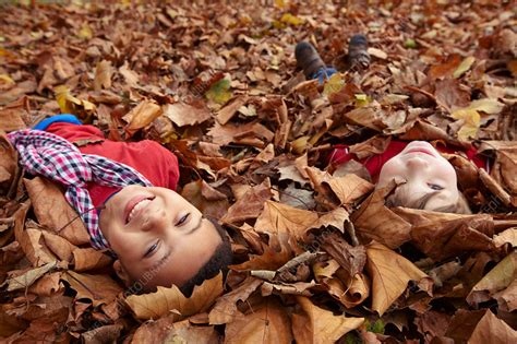 Children Playing In Autumn Leaves Stock Image F0052770 Science