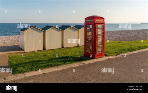 Beach Huts And Phone Booth Near Trhe Pebble Beach Budleigh Salterton Jurassic Coast Devon Uk