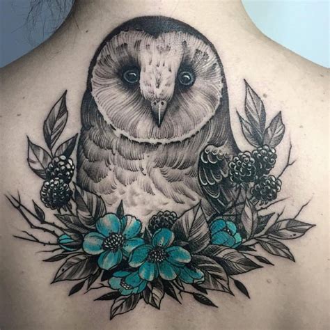 Nice Owl And Flowers Tattoo On Upper Back By Marta Teterina