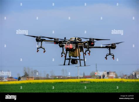 Agricultural Drone Spraying Pesticides Drones Are Used In Agriculture Stock Photo Alamy