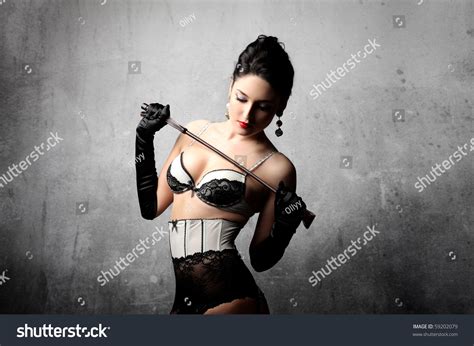 Sexy Woman Lingerie Holding Whip