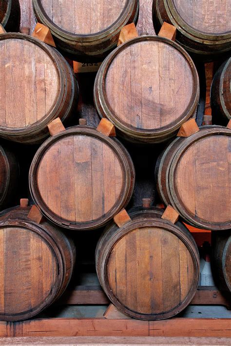 Wine Barrels Stacked Inside Winery By Yinyang