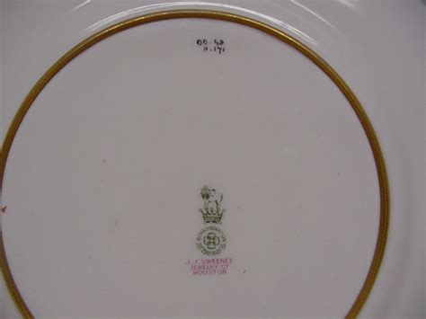 12 Royal Doulton Pink Enamel And Gold Service Plates