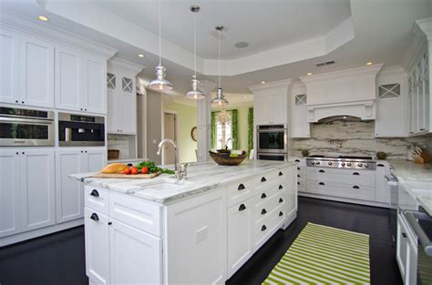 In the master bedroom of a weekend retreat in new york's hudson river valley by architect. Tray Ceiling Kitchen - Transitional - kitchen - CASE Design