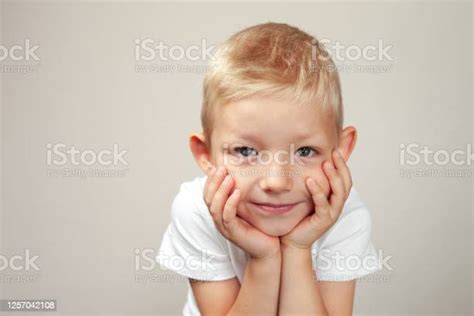 Studio Portrait Of A 4 Year Old Baby Boy Stock Photo Download Image