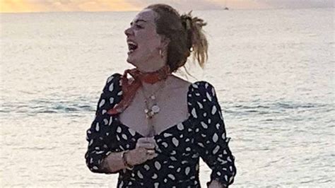 Adele Shows A Lot Of Leg On The Beach In Figure Hugging Sundress