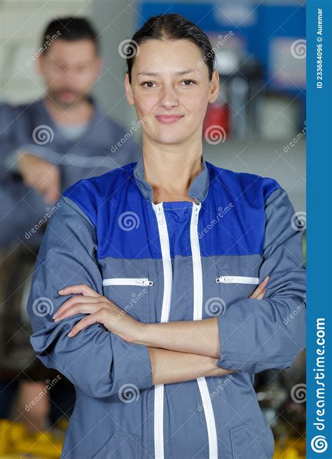 Female Mechanic Looking At Camera Stock Photo Image Of Damage