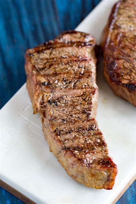 How long do you cook steak in the oven? Traeger Grilled New York Strip | Pellet Grill Steak Recipe