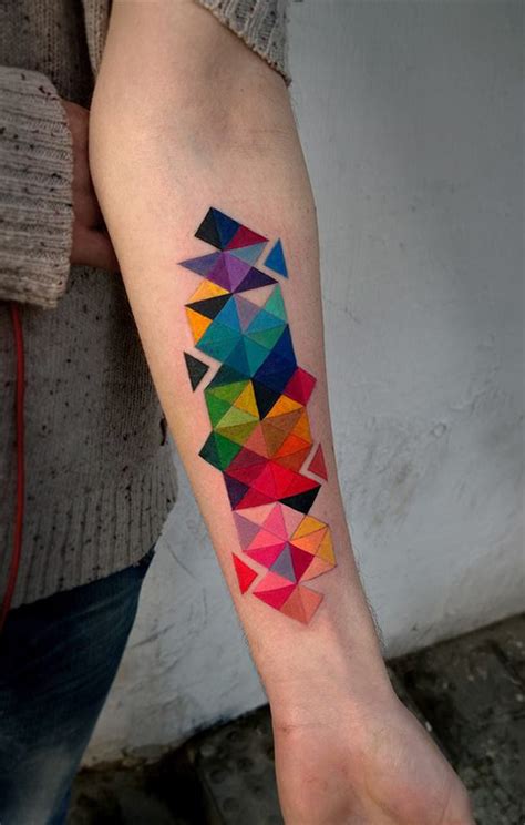 Instead of going for large size mountain tattoo design you can opt for a small or even minimal mountain tattoo like this. Colorful Geometric Tattoo | Best tattoo design ideas