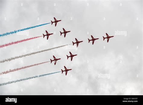 The Red Arrows In Concorde Formation During Their Exciting Aerobatic