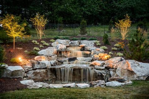 All aquascape waterfall and pond kits come with a welcome kit featuring comprehensive product installation support and tips, along with starter product description. Add outdoor lighting to your pondless waterfall | Water ...