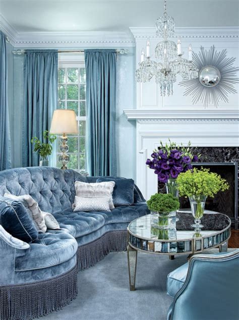 A blue sofa as the focal point flows beautifully with the background color of the room alongside the table and curtain. 20 Stunning Ice Blue Living Room Design Ideas For ...