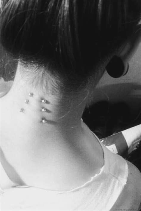 87 bold and exciting places to get your first surface piercing border tattoo