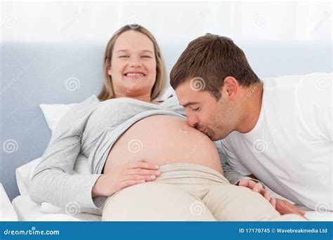 Happy Man Kissing The Belly Of His Pregnant Wife Stock Image Image Of Female People 17170745