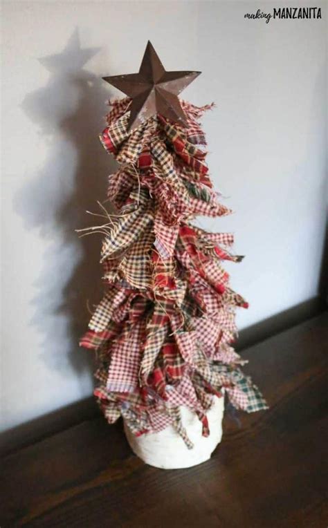 learn how to make these primitive mini christmas trees with homespun fabric wooden dowel metal