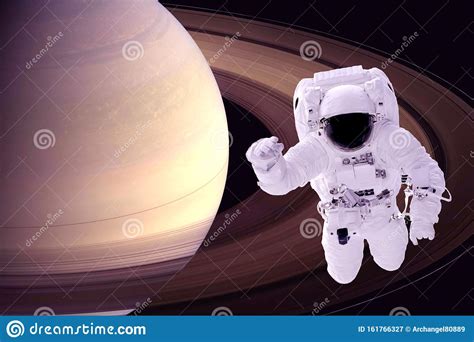 Saturn Orbiting Astronaut Elements Of This Image Were