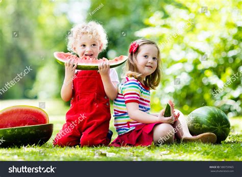Child Eating Watermelon Garden Kids Eat Stock Photo 588759965