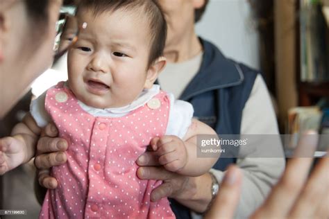 Young Japanese Mother And Baby Girl High Res Stock Photo Getty Images