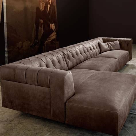 Has matching coffee and end table, sold separately. Contemporary L-Shape Sofa - Wooden-It-Be-Nice