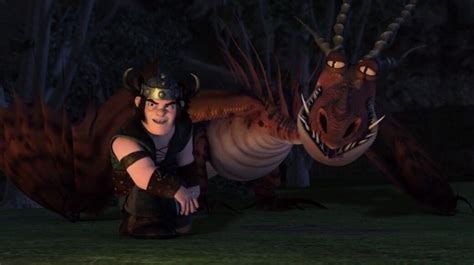 A Woman Kneeling Down Next To A Dragon With Horns On Its Head And Eyes