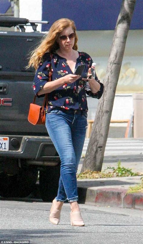 Amy Adams Pairs Fitted Jeans With Cherry Patterned Top While Running