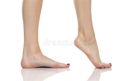 Side View Of A Beautifully Cared Female Feet On A White Background