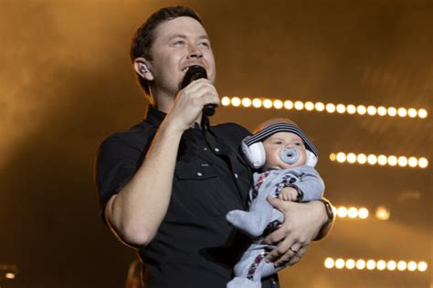 WATCH Scotty McCreery Shares Milestone Moment With Month Old Son Avery On Stage In Knoxville