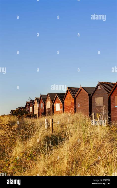 Beach Huts At Dusk Studland Beach Dorset Stock Photo Alamy