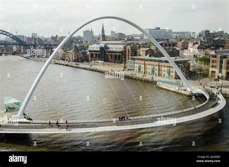The Gateshead Millennium Bridge Spanning The River Tyne At Gateshead