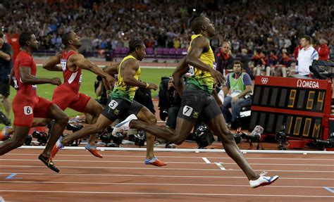 usain bolt wins second consecutive olympic 100 meter gold