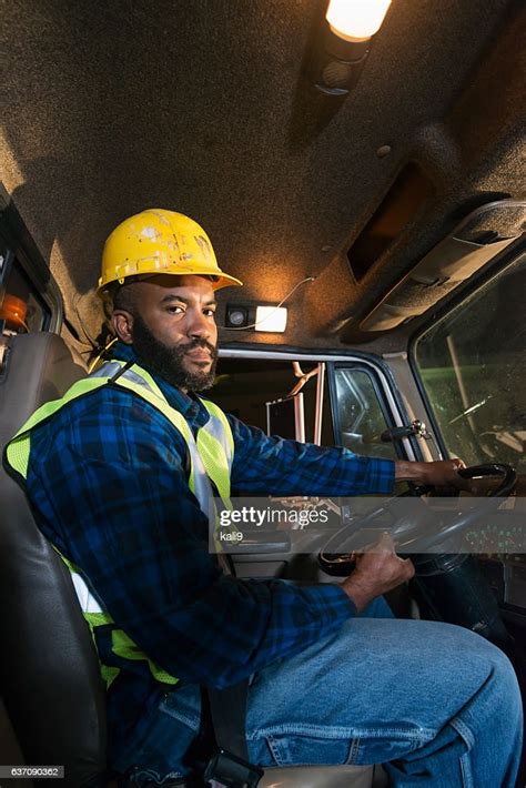 African American Truck Driver Wearing Hardhat High Res Stock Photo