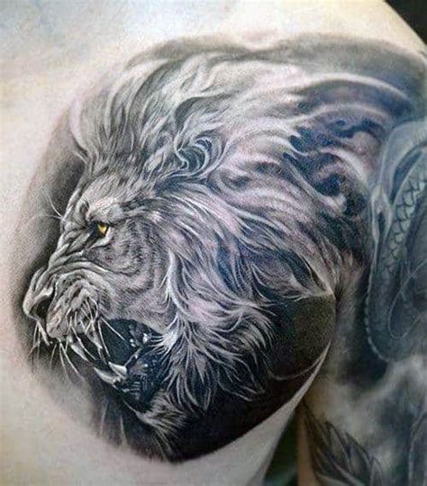 Lion head tattoo on chest. 85 Lion Tattoos For Men - A Jungle Of Big Cat Designs