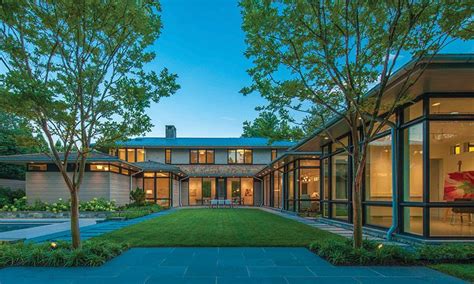 Expansive Windows Overlook The Rear Courtyard Of A Bethesda Home Clad