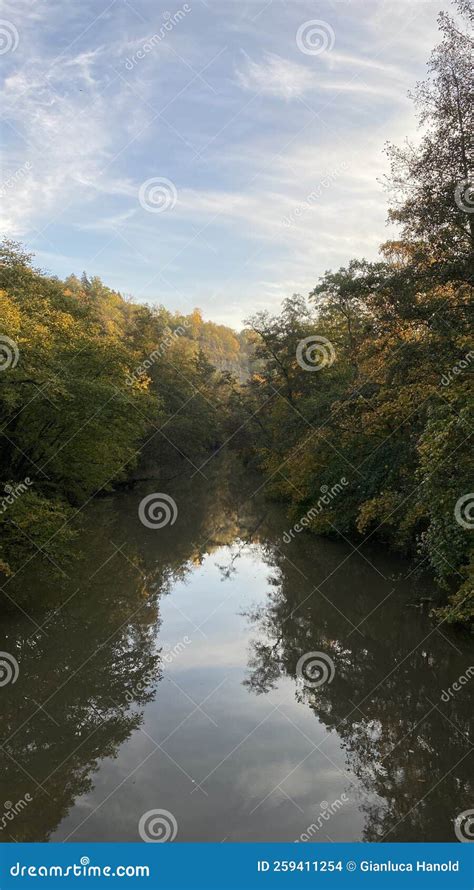 Trees Reflect In The River In The Autumn Sunshine Stock Photo Image