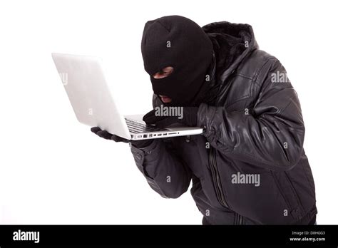 Disguised Computer Hacker Stock Photo Alamy