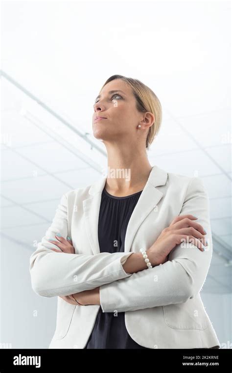 Determined Woman Looking Into The Future In An Epic Pose Stock Photo