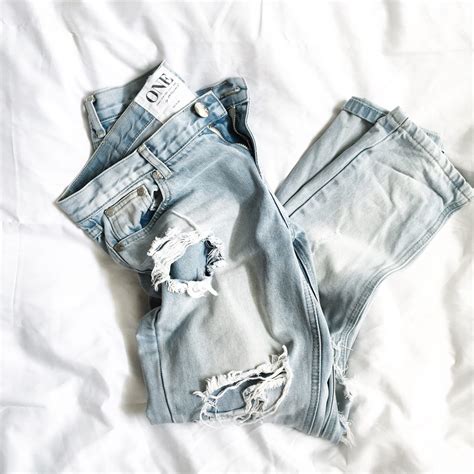 how to wear ripped jeans 3 ways bikinis and passports