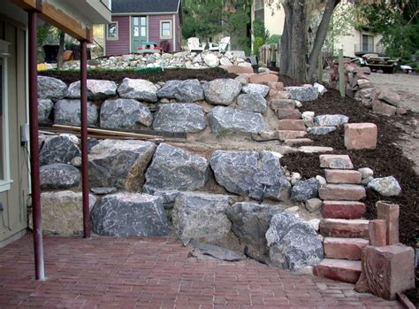 With mixed size stones and different shapes. Glad You Asked: What Kind of Rock Makes a Good Wall ...