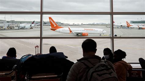 sunwing party flight canadians stuck in cancun after drinking vaping maskless aboard plane