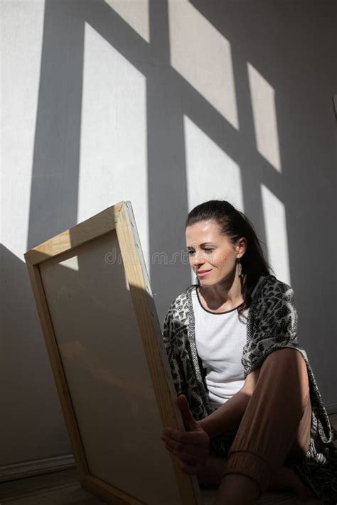 A Woman Artist Stands At An Easel With A Palette Of Art Drawing Stock