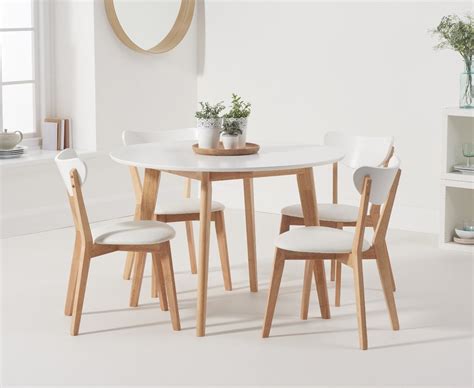 Or, create a breakfast nook in an empty corner of the kitchen with a small bench and table, perfect for enjoying a cup of tea and toast in the morning. Rebekah White And Oak 110cm Round Dining Table With ...