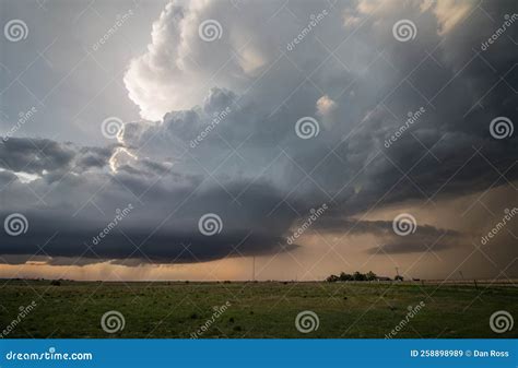 A Towering Supercell Thunderstorm Or Cumulonimbus Cloud Moves Over