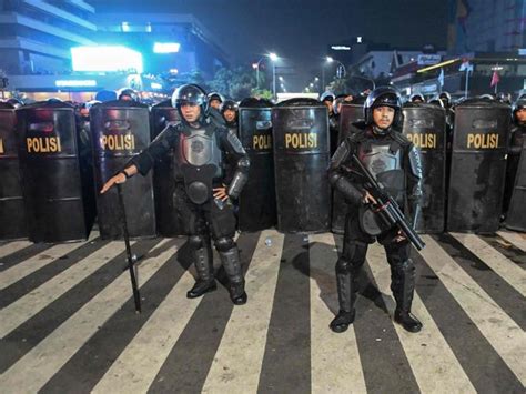Indonesian Police Fire Tear Gas To Disperse Protesters After President Joko Widodo Re Elected